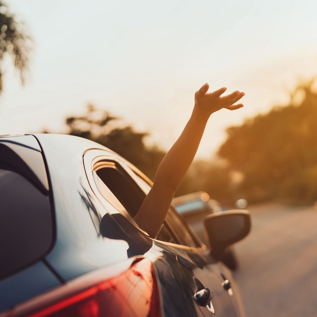 Hatchback Car travel driving road trip of woman summer vacation in blue car at sunset,Girls happy traveling enjoy holidays and relaxation with friends together get the atmosphere and go to destination