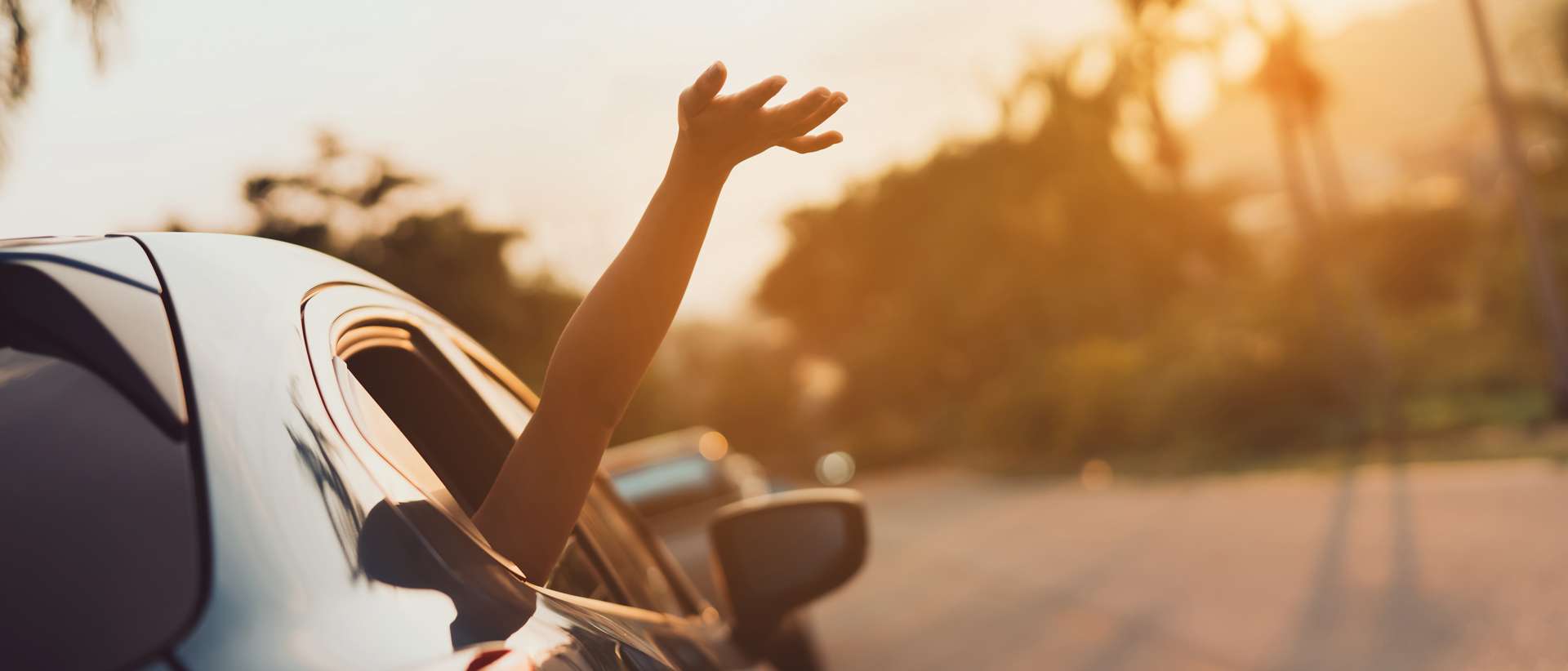 Hatchback Car travel driving road trip of woman summer vacation in blue car at sunset,Girls happy traveling enjoy holidays and relaxation with friends together get the atmosphere and go to destination