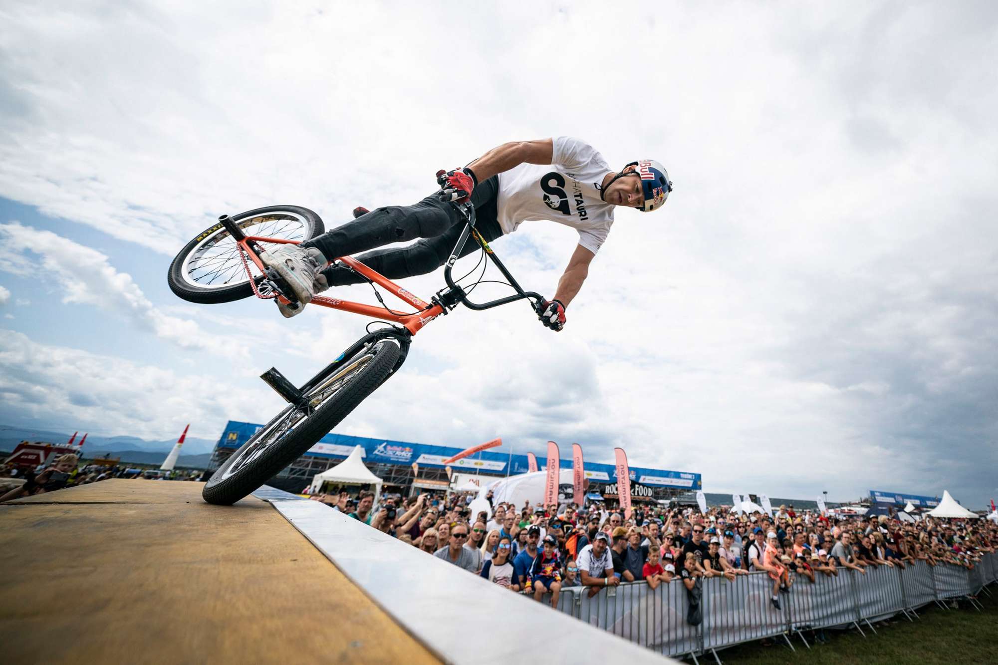 Trial bike athlete Senad Grosic of Croatia performs during a side act at the sixth round of the Red Bull Air Race World Championship in Wiener Neustadt, Austria on September 15, 2018.