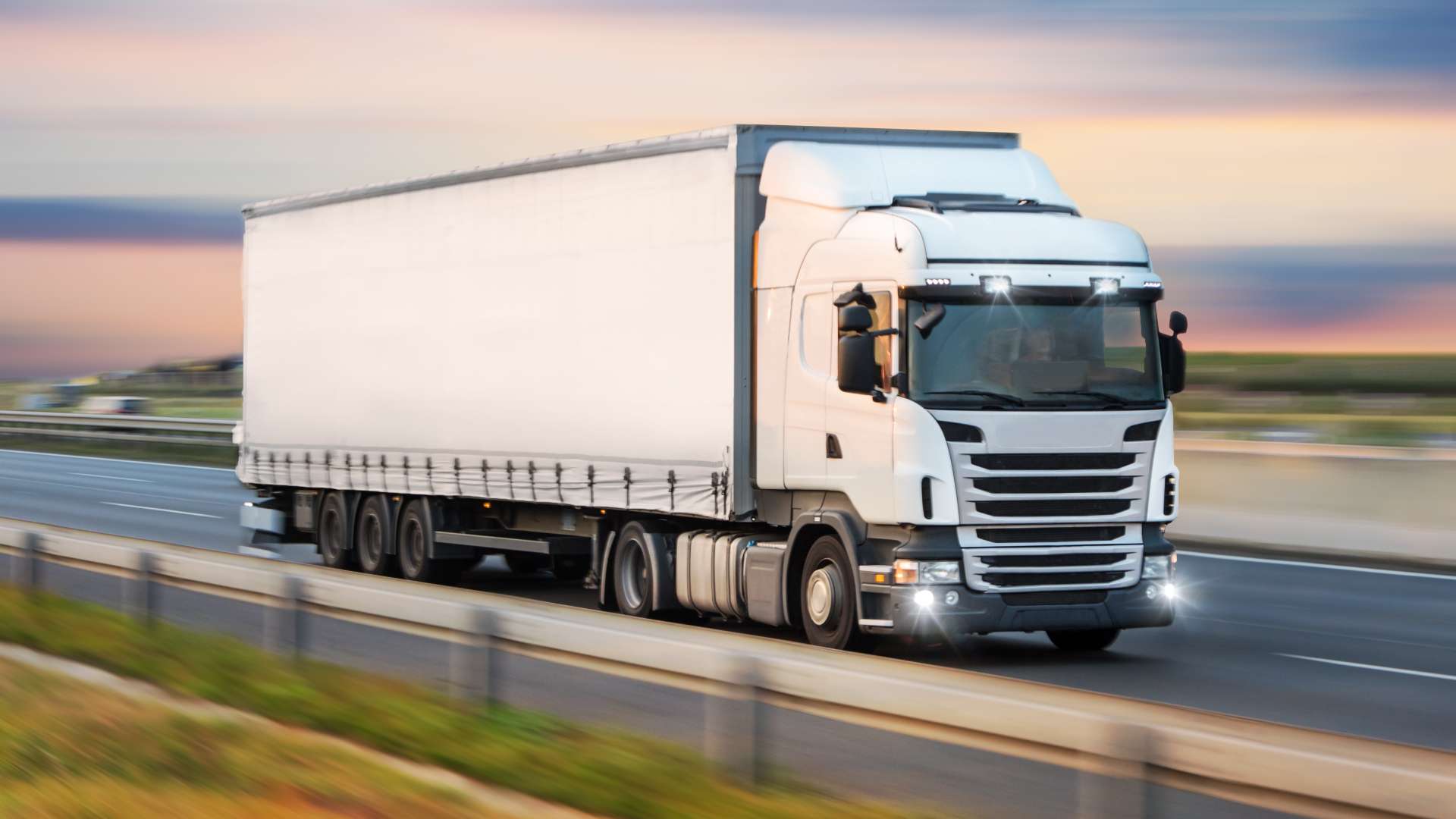 Truck with container on highway, cargo transportation concept.