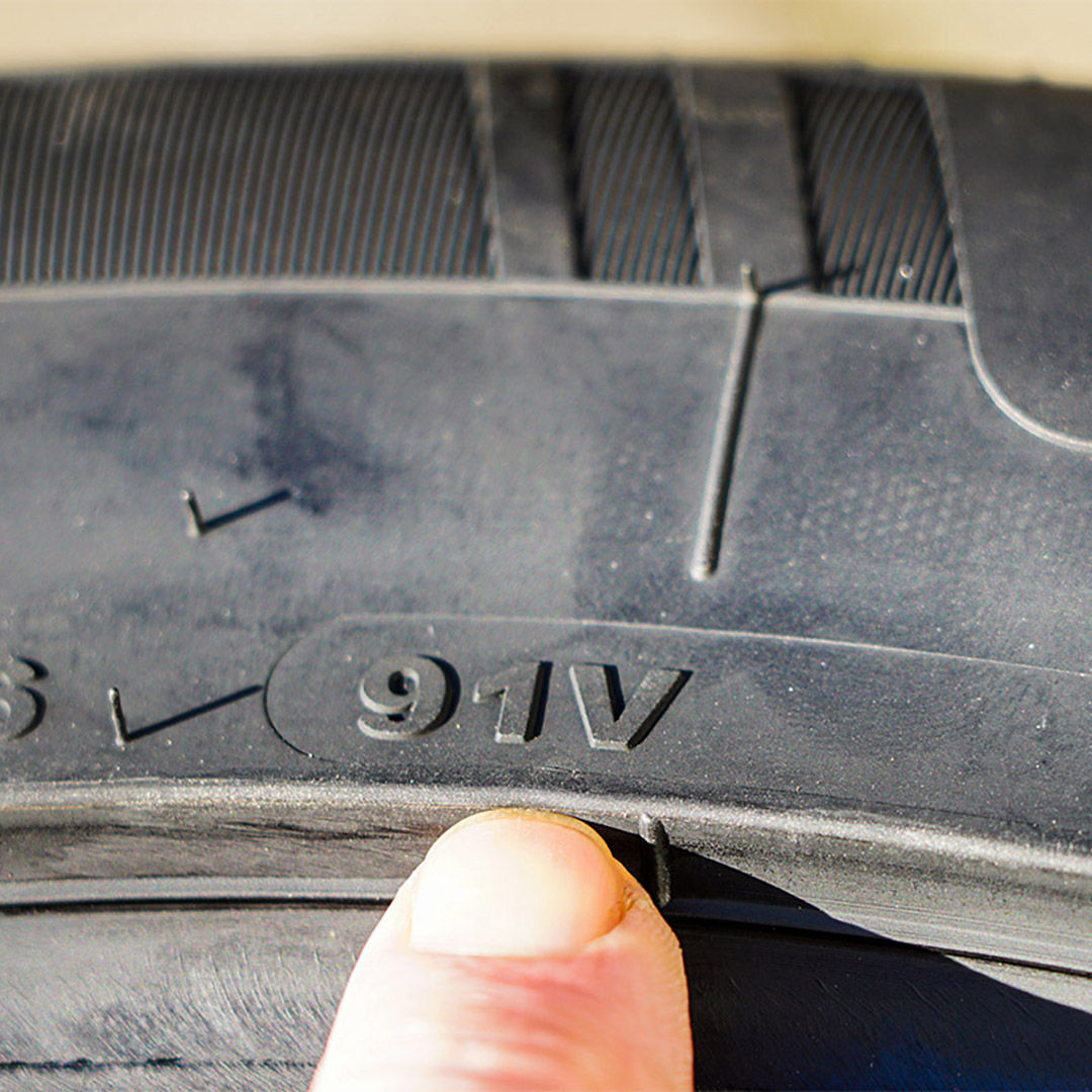the speed and load index markings on the sidewall of the tire