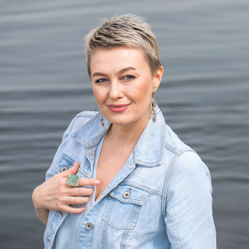 Portrait of a young beautiful blonde woman in jeans jacket